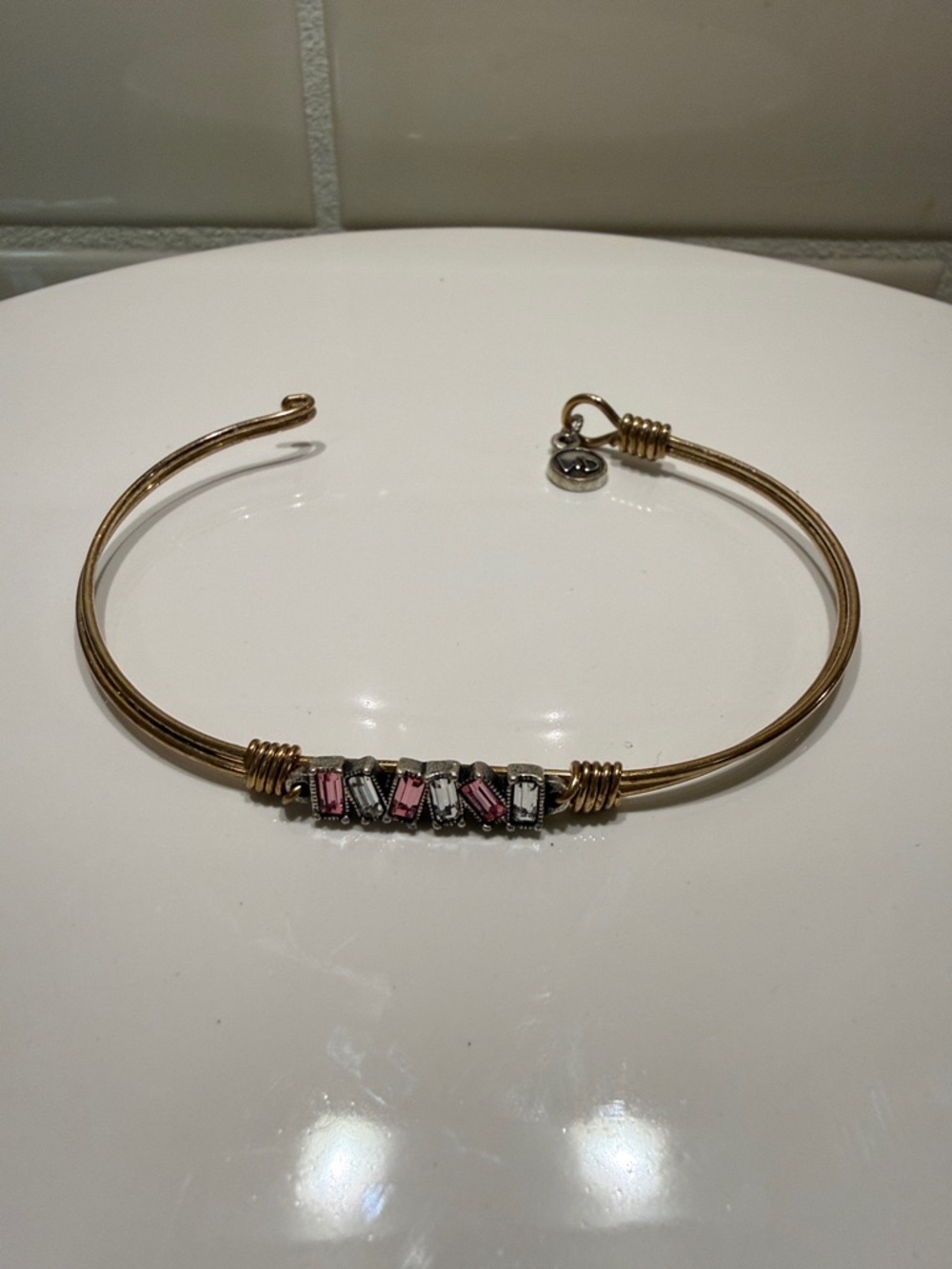 Gold-Tone Open Cuff Bracelet with Pink Crystal Accents